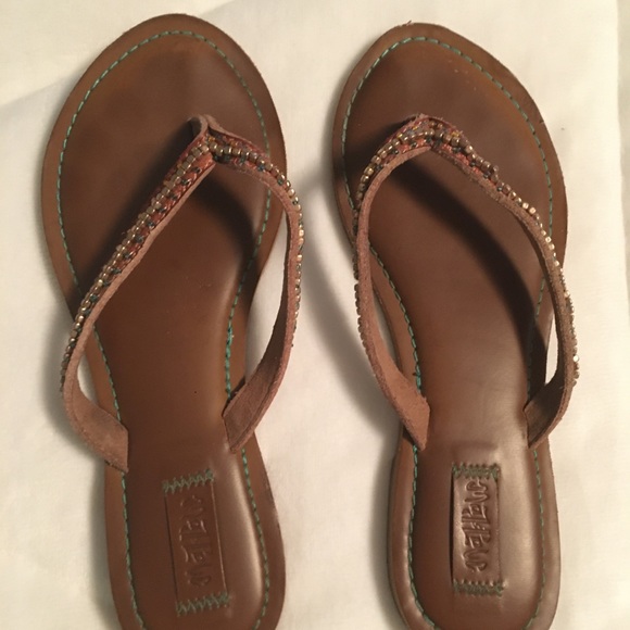 Shoes - Brown beaded flip flops.
